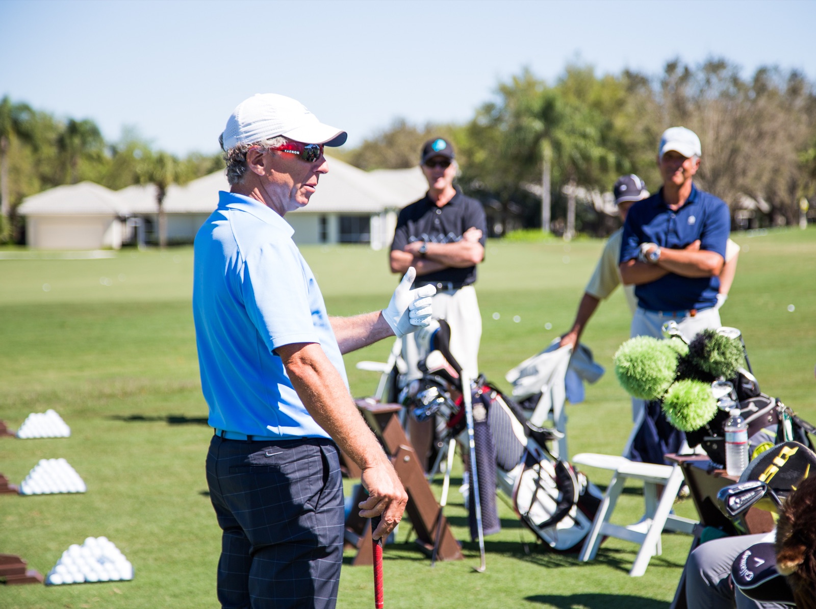 Impact Zone Golf clinic instruction on the range