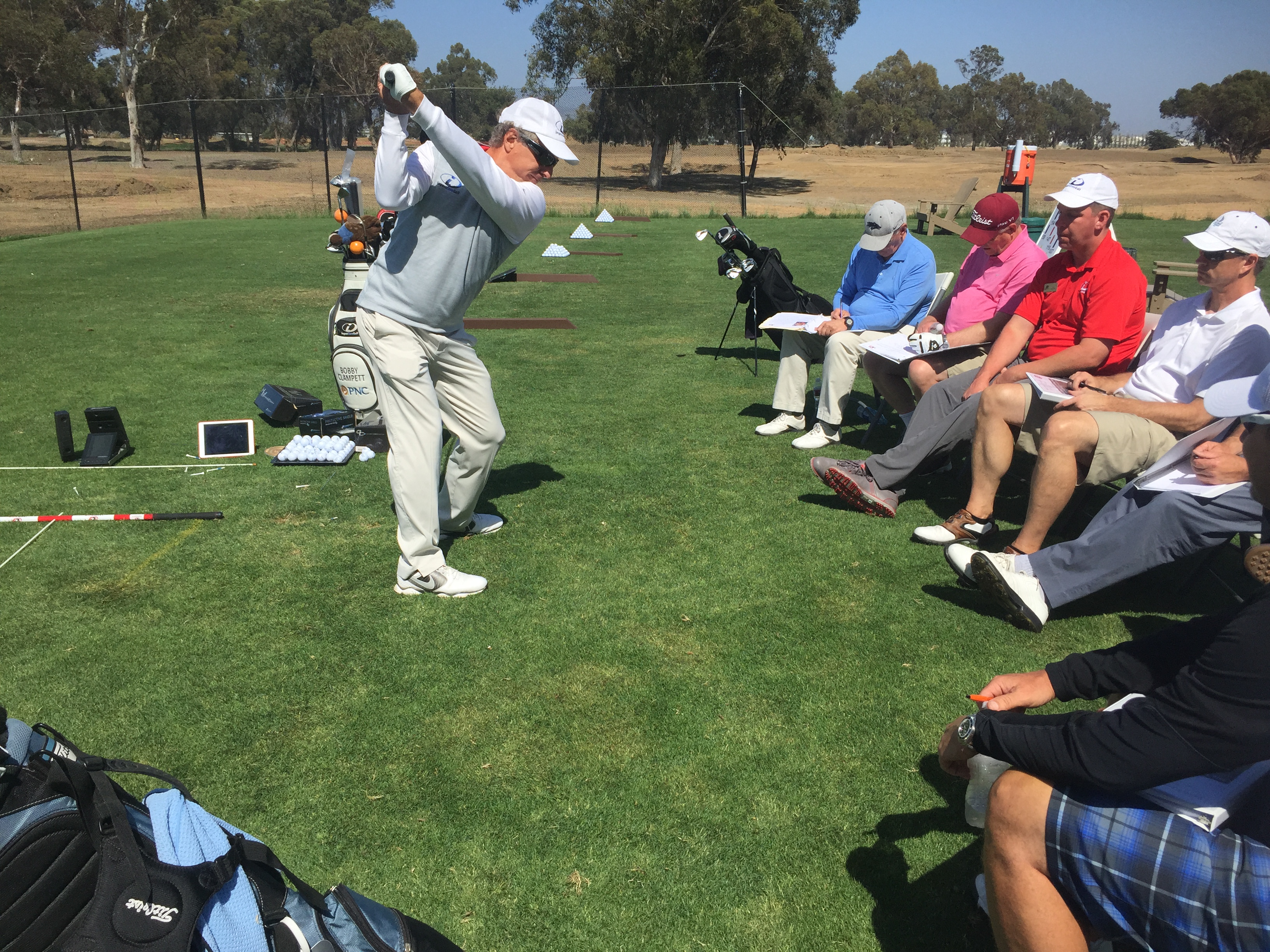 Impact Zone Golf instructor working with students